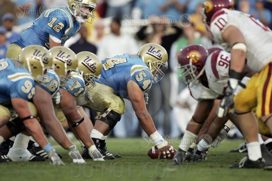 2 December 2006: Robert Chai (54) at the line of scrimmage during Pac-10 college football upset UCLA beat the Trojans 13-9 during the final home game of the season for the UCLA Bruins vs the University of Southern California USC Trojans at the Rose Bowl in Pasadena, CA.